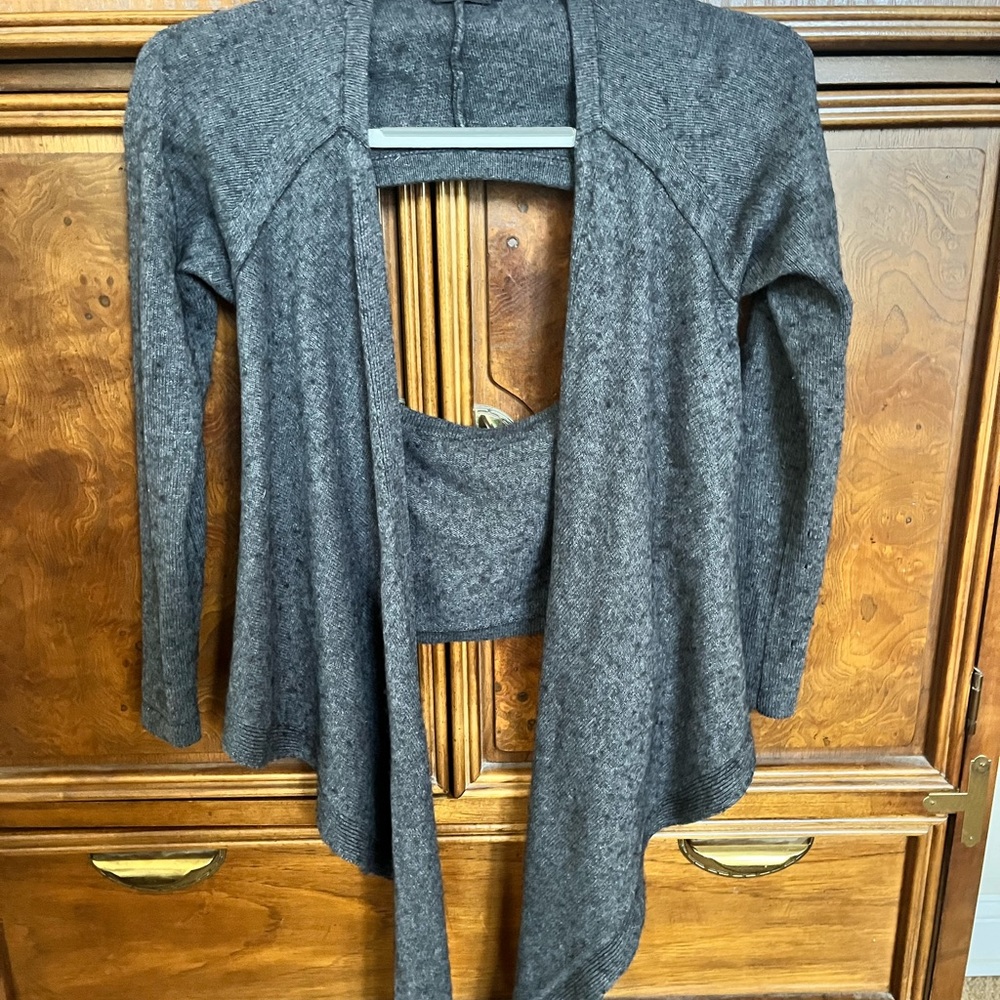 Wool sweater wrap around with cutout back never worn. Sleeve 25”. Pit to pit 17”